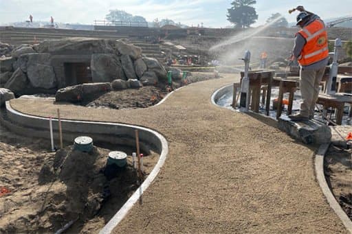 After Endicott Pathway Aggregate is installed and compacted it is good to spray it to make sure the Organic-Lock™ sets.