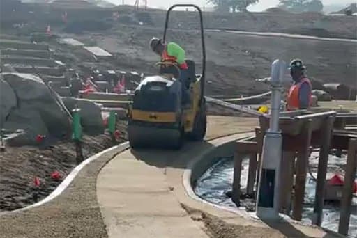 A 1 ton roller can be used to compact the aggregate thouroughly.