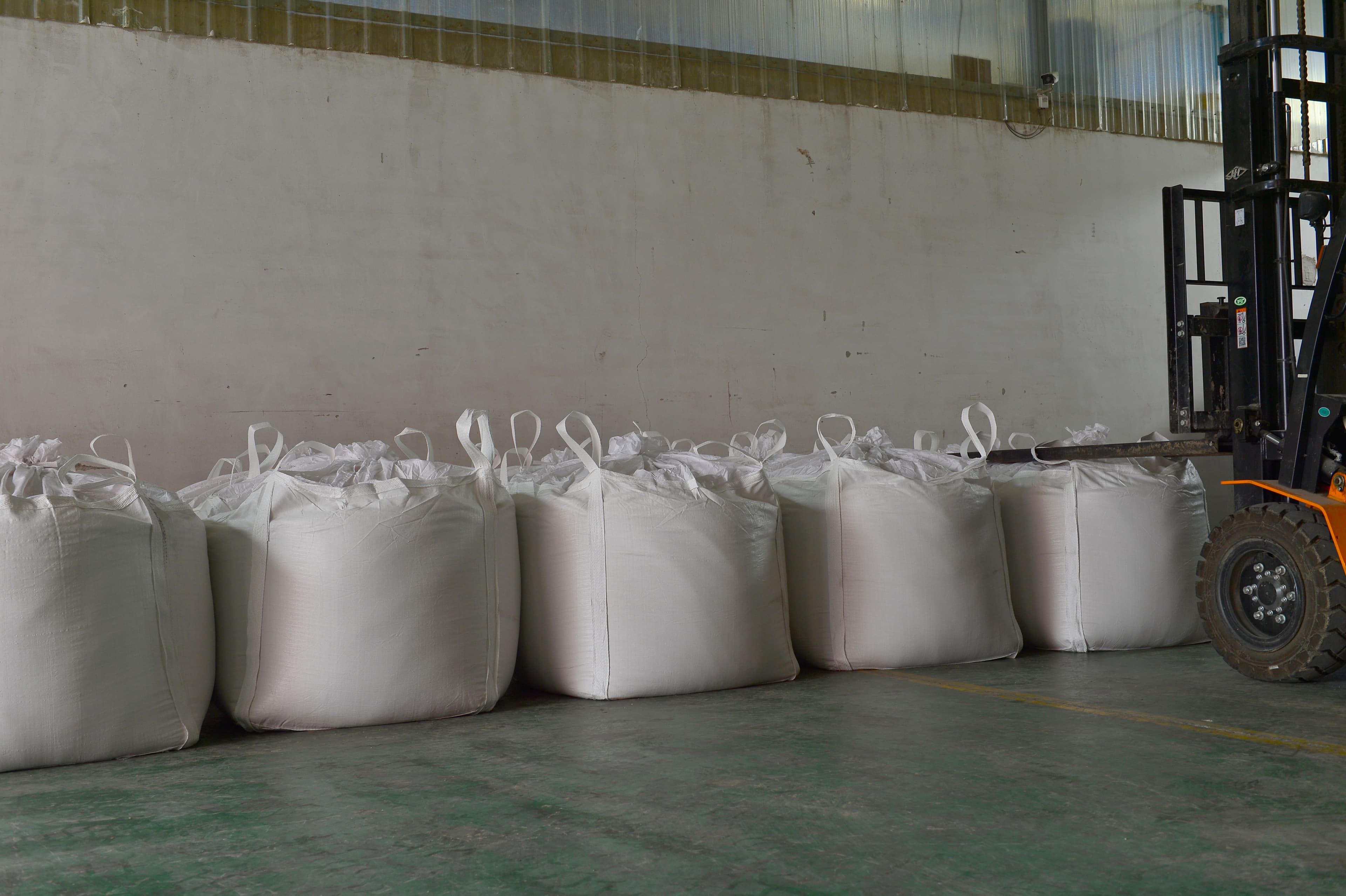 Truck delivering Endicott Pathway Aggregate in super sacks.
