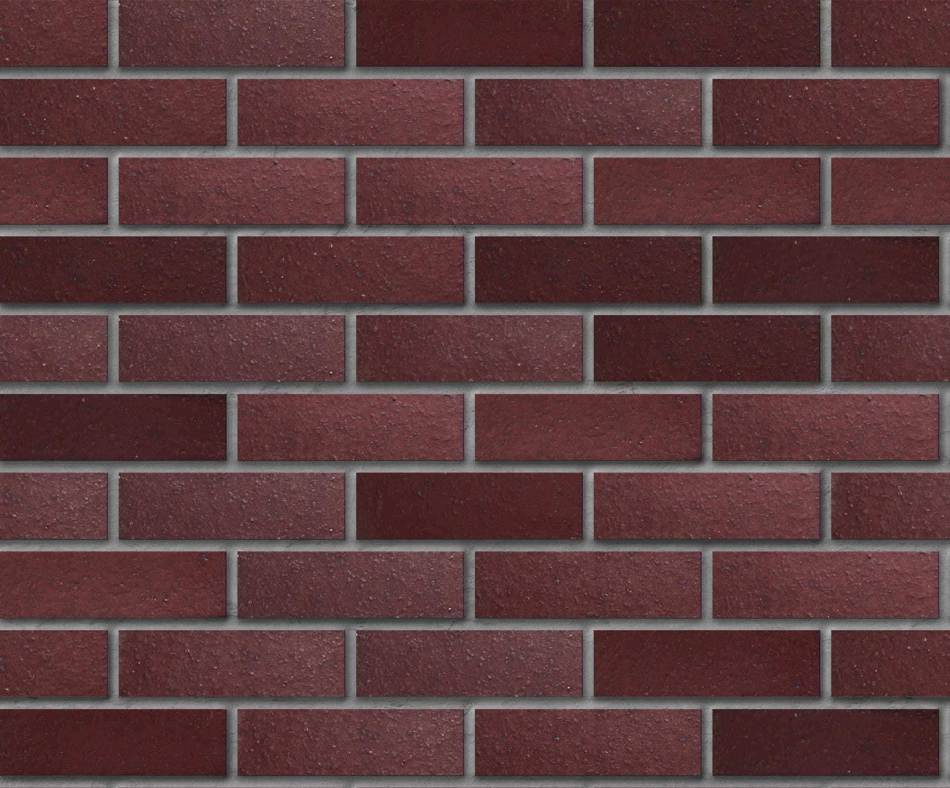 Medium Ironspot #46 colored brick, in the colorGroup Red Brick, Burgundy Brick. The product is clay brick.